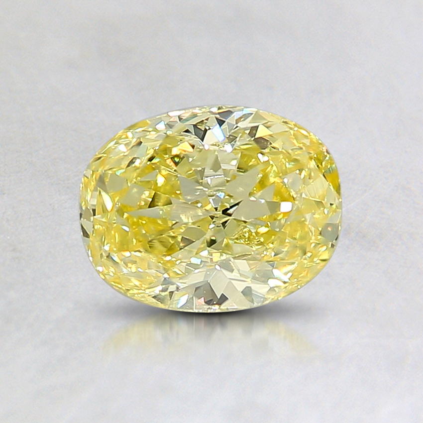0.80 Ct. Natural Fancy Intense Yellow Oval Diamond DY0.80OVFIYVS1